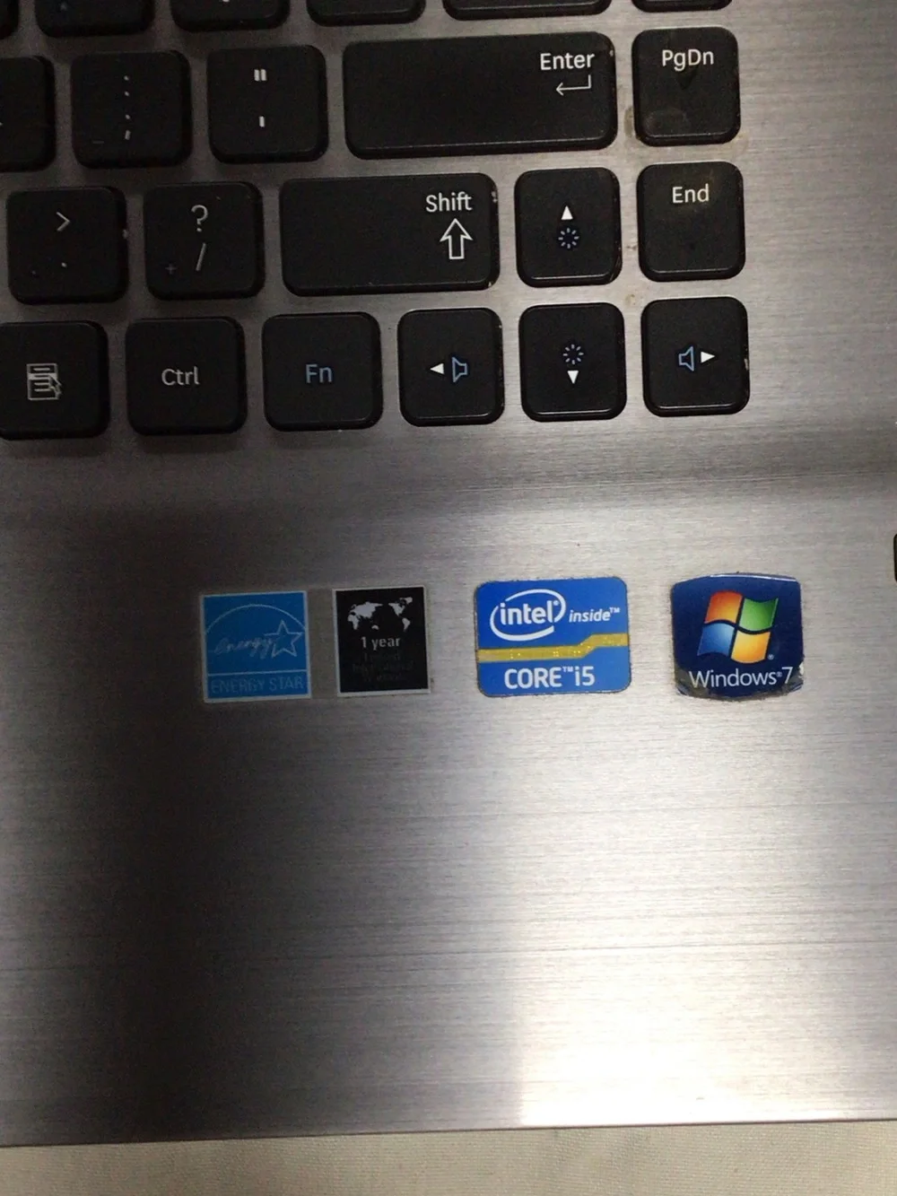Samsung Silver and Black Laptop with Windows 7 Setup Screen